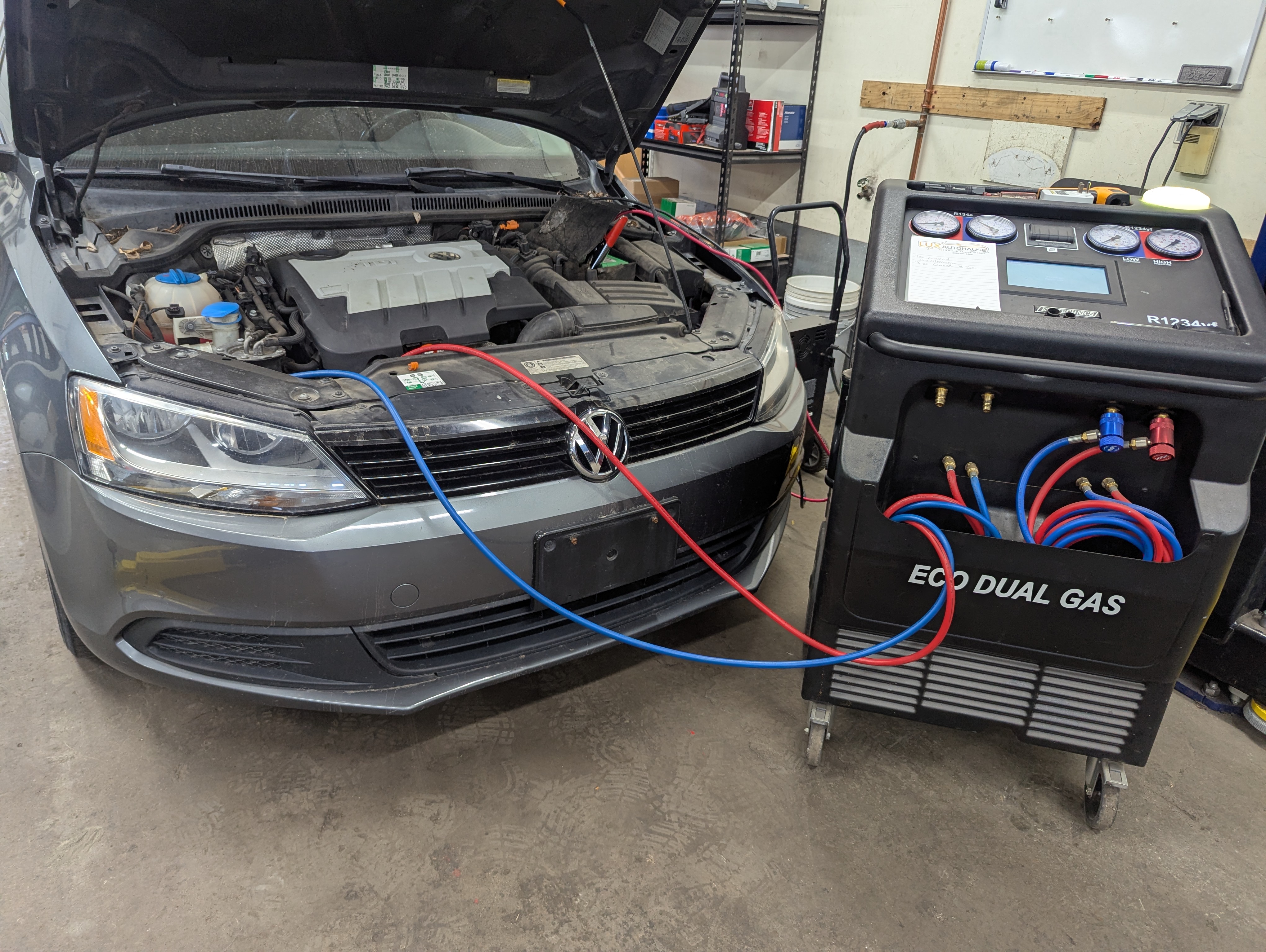 Volkswagen Jetta connected to ECO Dual Gas A/C service machine at Lux AutoHause